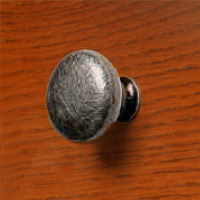 ART55430 Ceramic Knob in Antique Cream finish with a Burnished Iron mount.